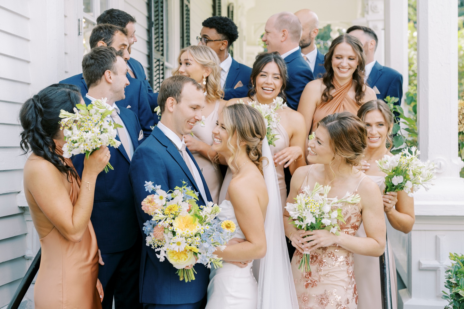 merrimon-wynne wedding photographer with bridal party on porch